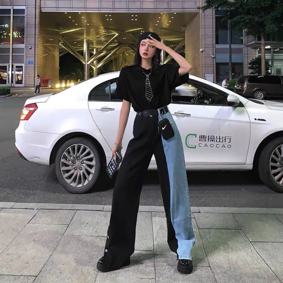 The new black and blue stitching contrast color high-waisted button slit jeans women's all-match tall and thin straight pants