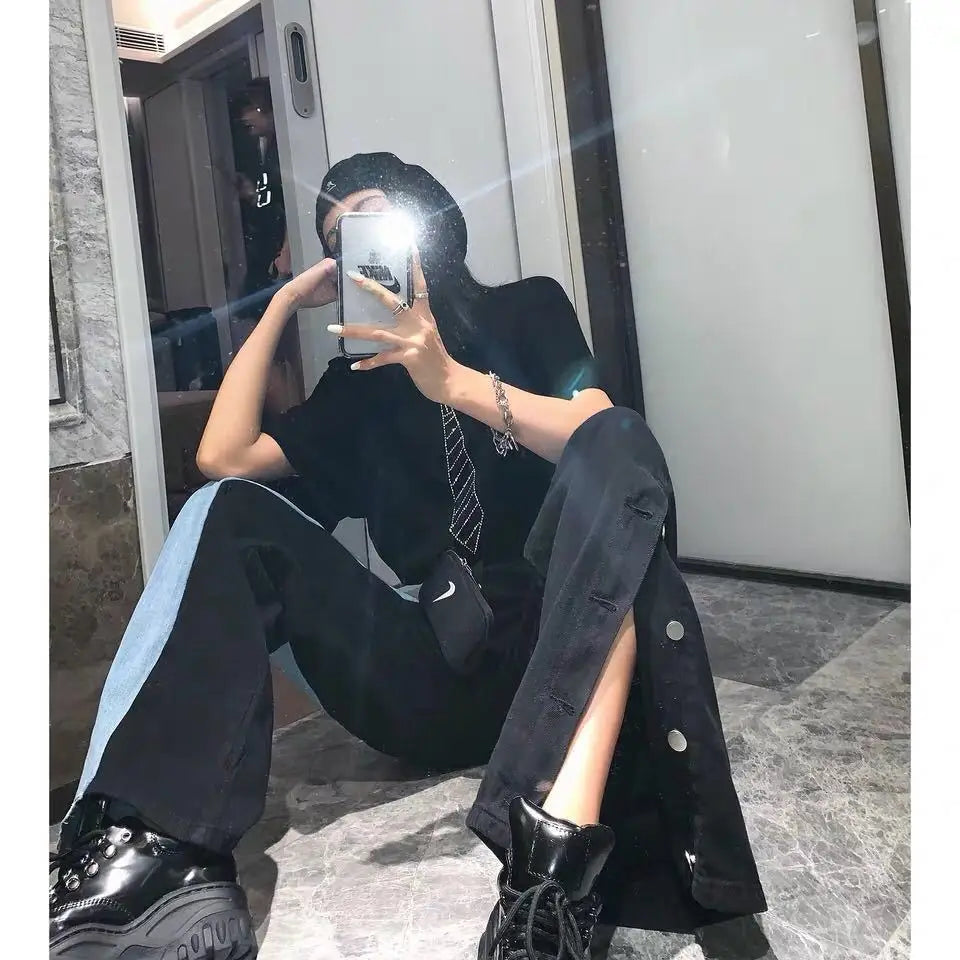 The new black and blue stitching contrast color high-waisted button slit jeans women's all-match tall and thin straight pants