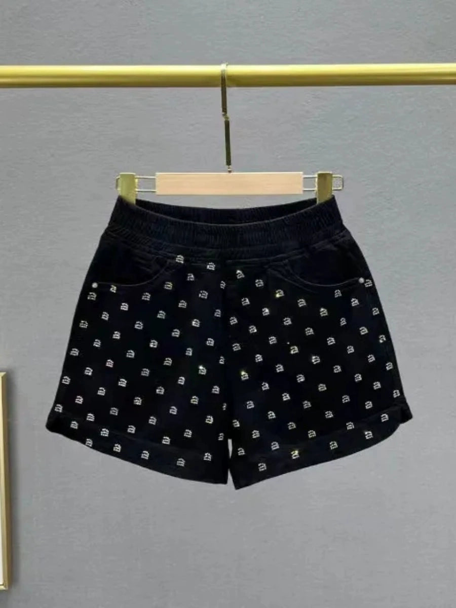 Produtos europeus soltos e finos com aparência de shorts jeans com strass