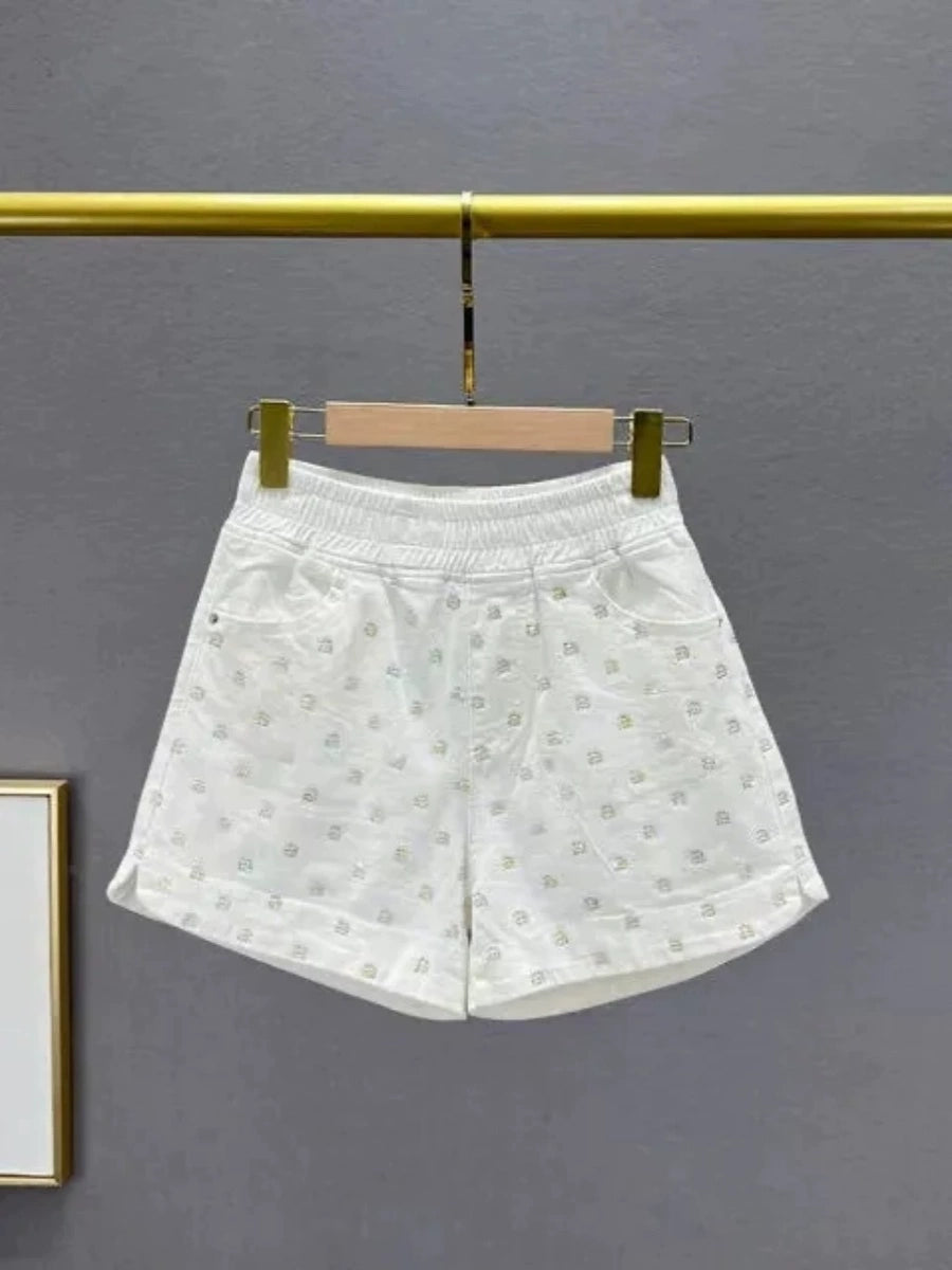 Produtos europeus soltos e finos com aparência de shorts jeans com strass