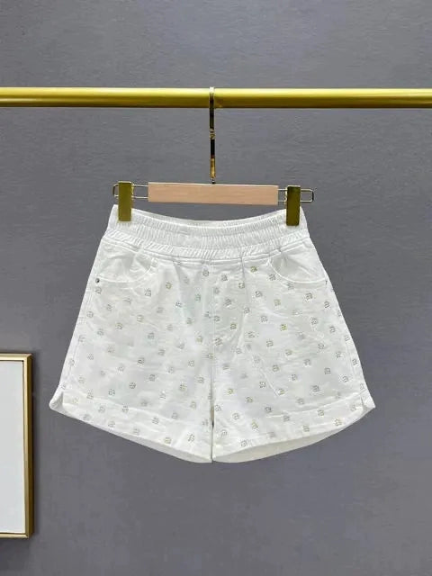 Produtos europeus soltos e finos com aparência de shorts jeans com strass