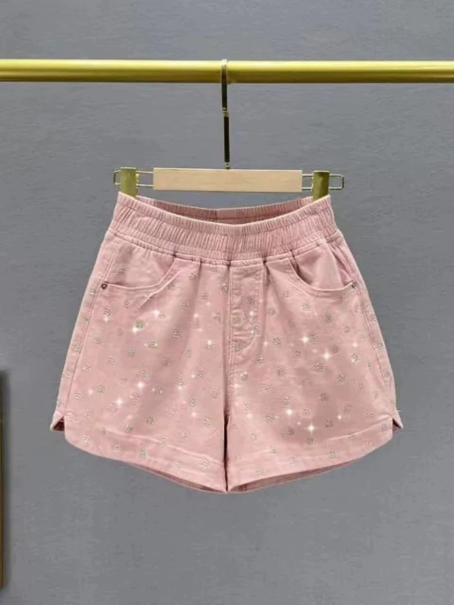 Produtos europeus soltos e finos com aparência de shorts jeans com strass