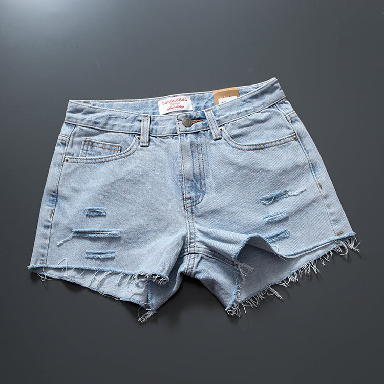 European K-style Tassel Mid-Waist White Hole Denim Shorts