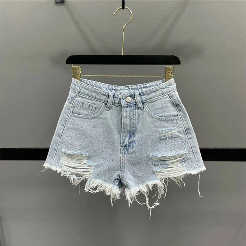 Shorts jeans com borlas perfuradas e bordas cruas para mulheres 2024, tendência de calças quentes de cintura alta e perna larga em linha A para meninas picantes