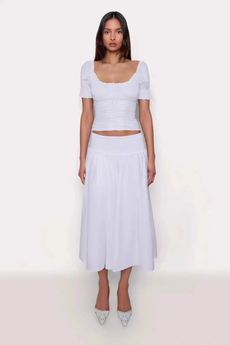 Guizio white short sleeved shirt with cinched waist and bubble sleeves, designed with Bella beer girl's retro half skirt