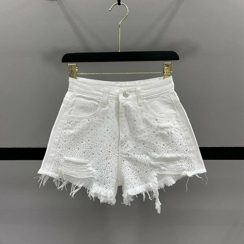 Shorts jeans com borlas perfuradas e bordas cruas para mulheres 2024, tendência de calças quentes de cintura alta e perna larga em linha A para meninas picantes