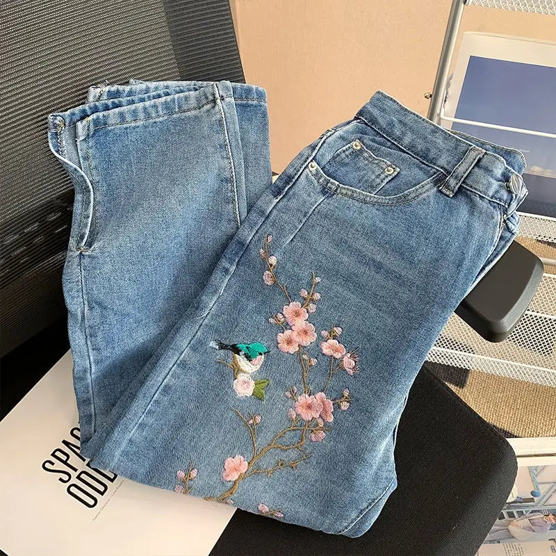 High waist embroidered flower jeans female autumn 2024 new retro high waist loose slim design sense niche split pants.