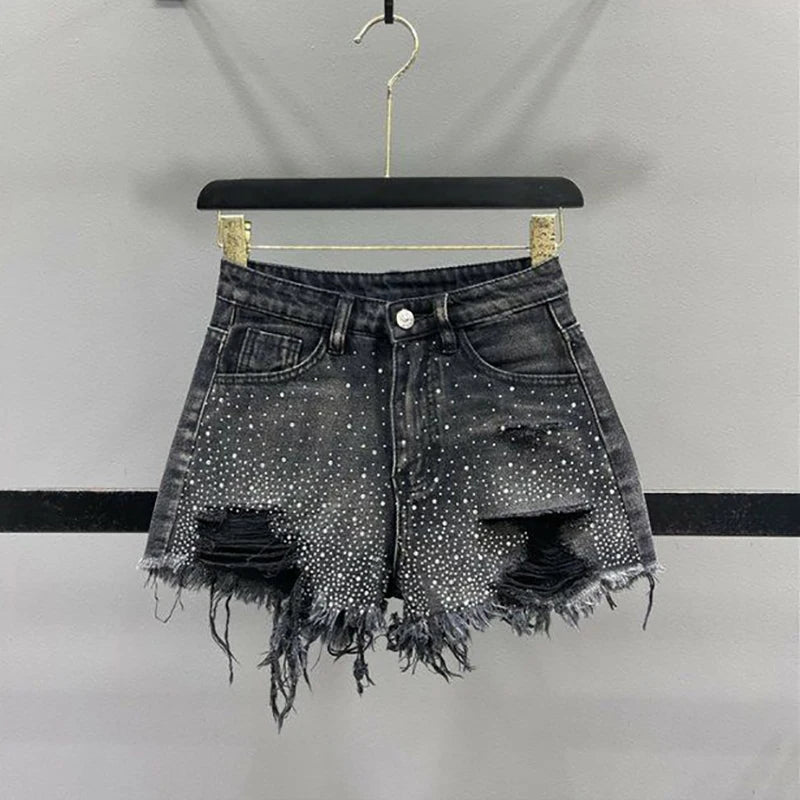 Shorts jeans com borlas perfuradas e bordas cruas para mulheres 2024, tendência de calças quentes de cintura alta e perna larga em linha A para meninas picantes