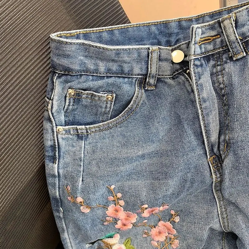 High waist embroidered flower jeans female autumn 2024 new retro high waist loose slim design sense niche split pants.