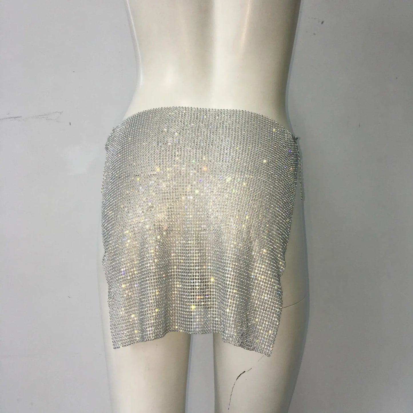 Mini saia luxuosa com glitter e diamantes para mulheres, saia curta sexy com fenda lateral de metal vazada, trajes para festa e festival Rave, novo